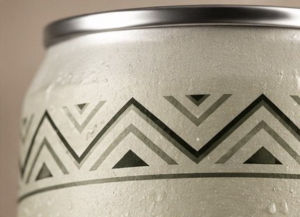 Close-up of a KAILYAN can showing its chevron border inspired by Cordillera geometric patterns.